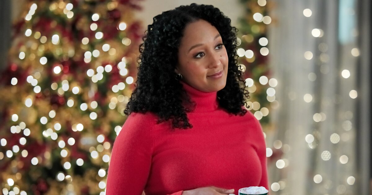 Tamera MowryHousley as Shelby in Inventing the Christmas Prince
