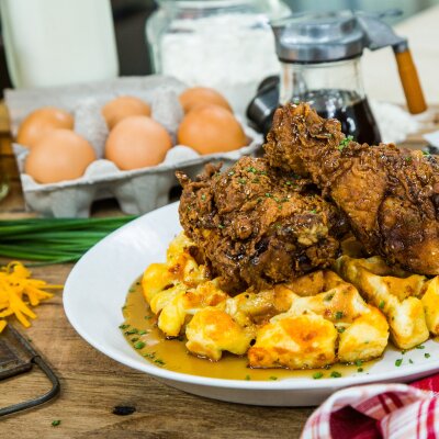 Buttermilk Fried Chicken w/Cheddar Chive Waffle & Bourbon Maple Syrup