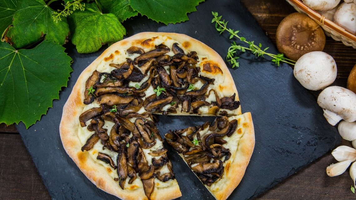 Mushroom & Goat Cheese Béchamel Pizza with Chateau Chantal Naughty Red
