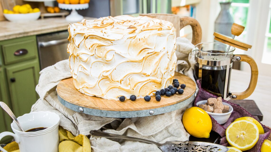 Lemon Custard Cake with Huckleberry Preserves and Toasted Marshmallow Frosting